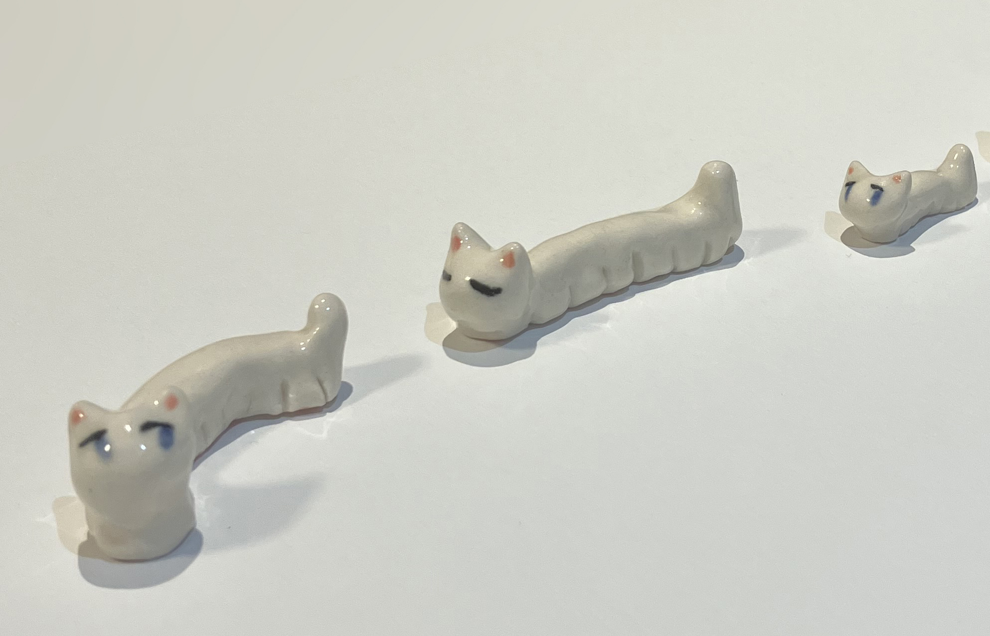 Porcelain long cats